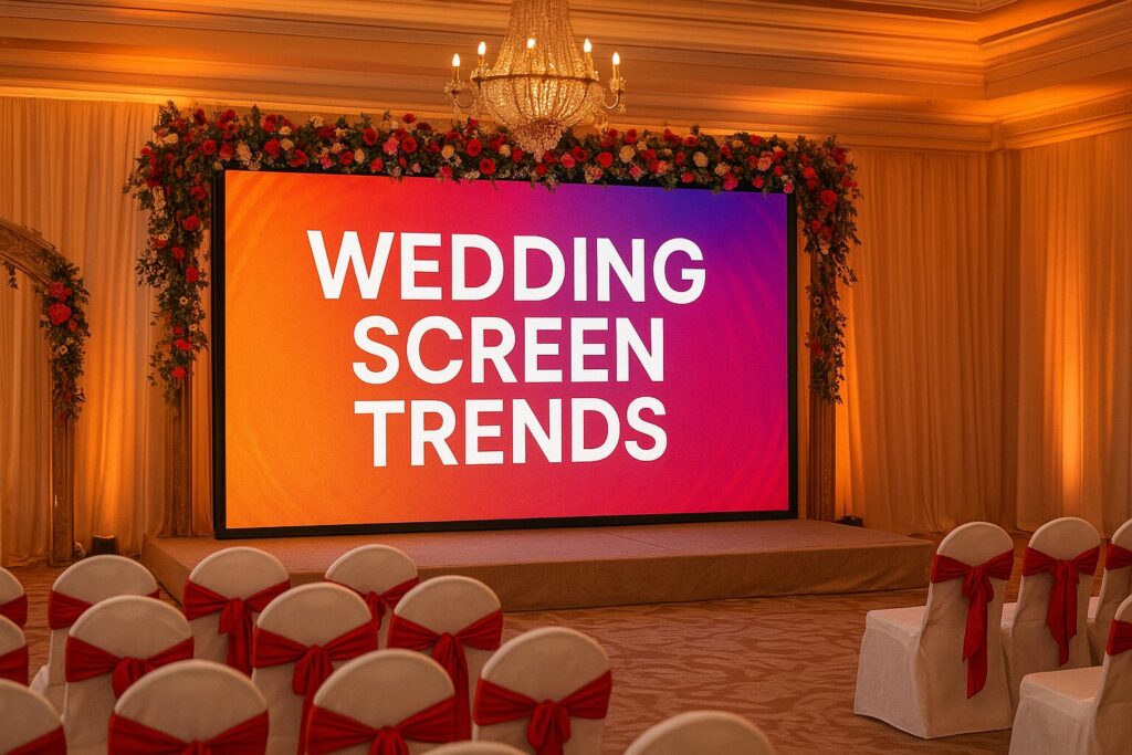 Large P2.5 SMD LED screen displaying wedding couple's photos in elegant Pakistani wedding hall with traditional decorative lighting and hundreds of guests seated at round tables